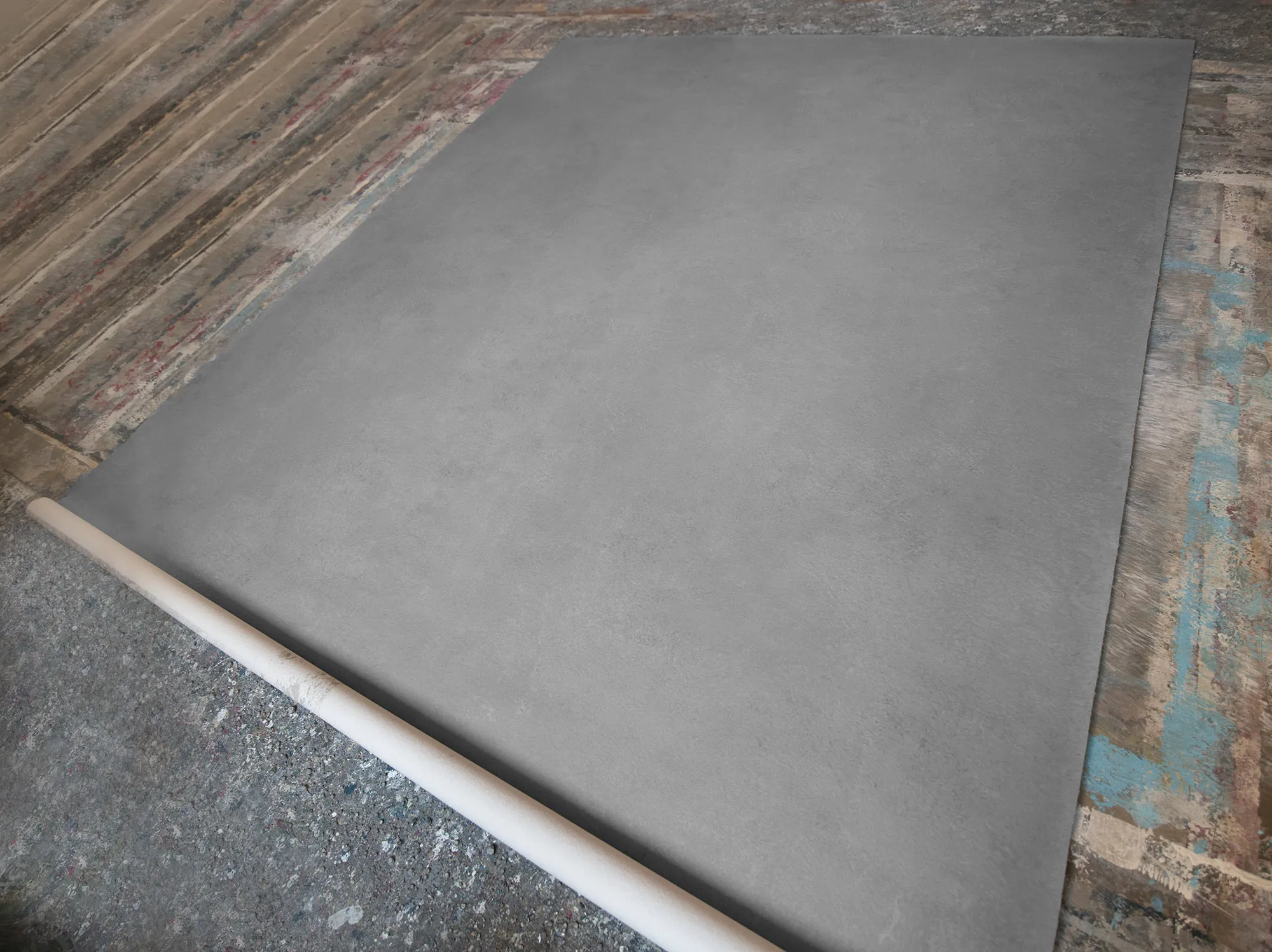 cement-backdrop Hand-painted canvas backdrop in cement color for photography.