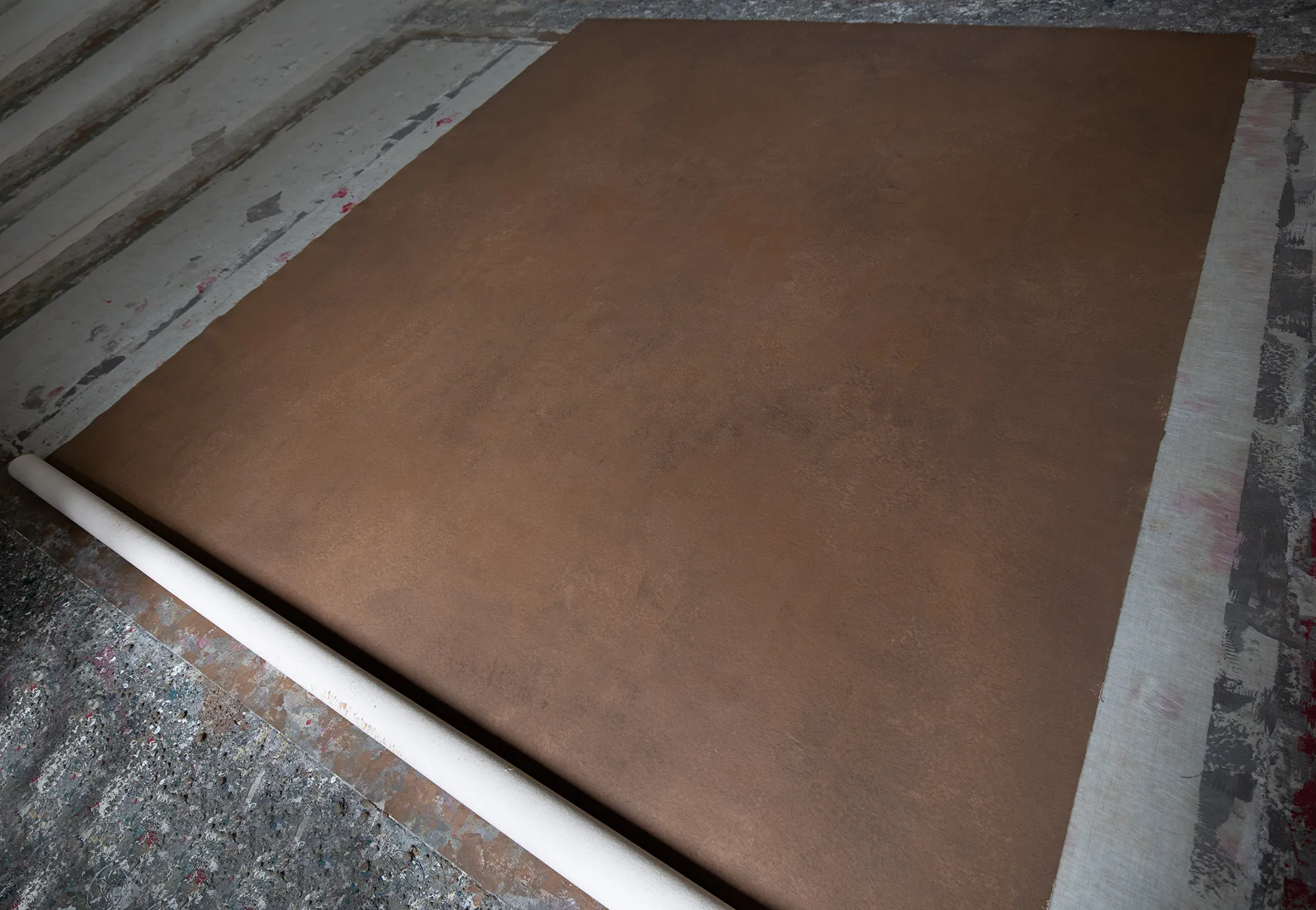 amber-photo-studio backdrop Hand-painted canvas backdrop in amber color for photography.